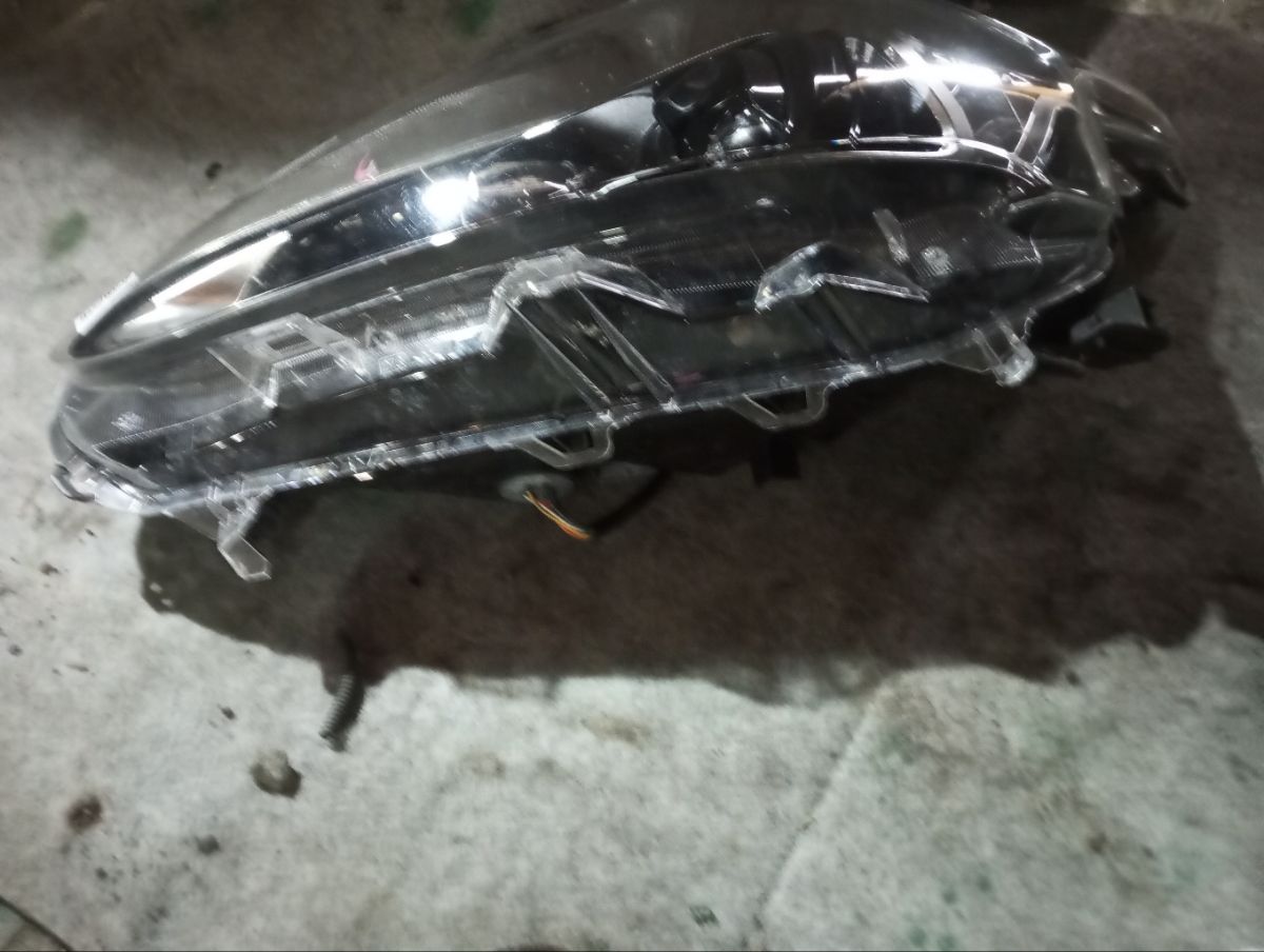 Фара 52-317 52-317,81150-52N00 на Toyota Sienta NSP170G Фото 8