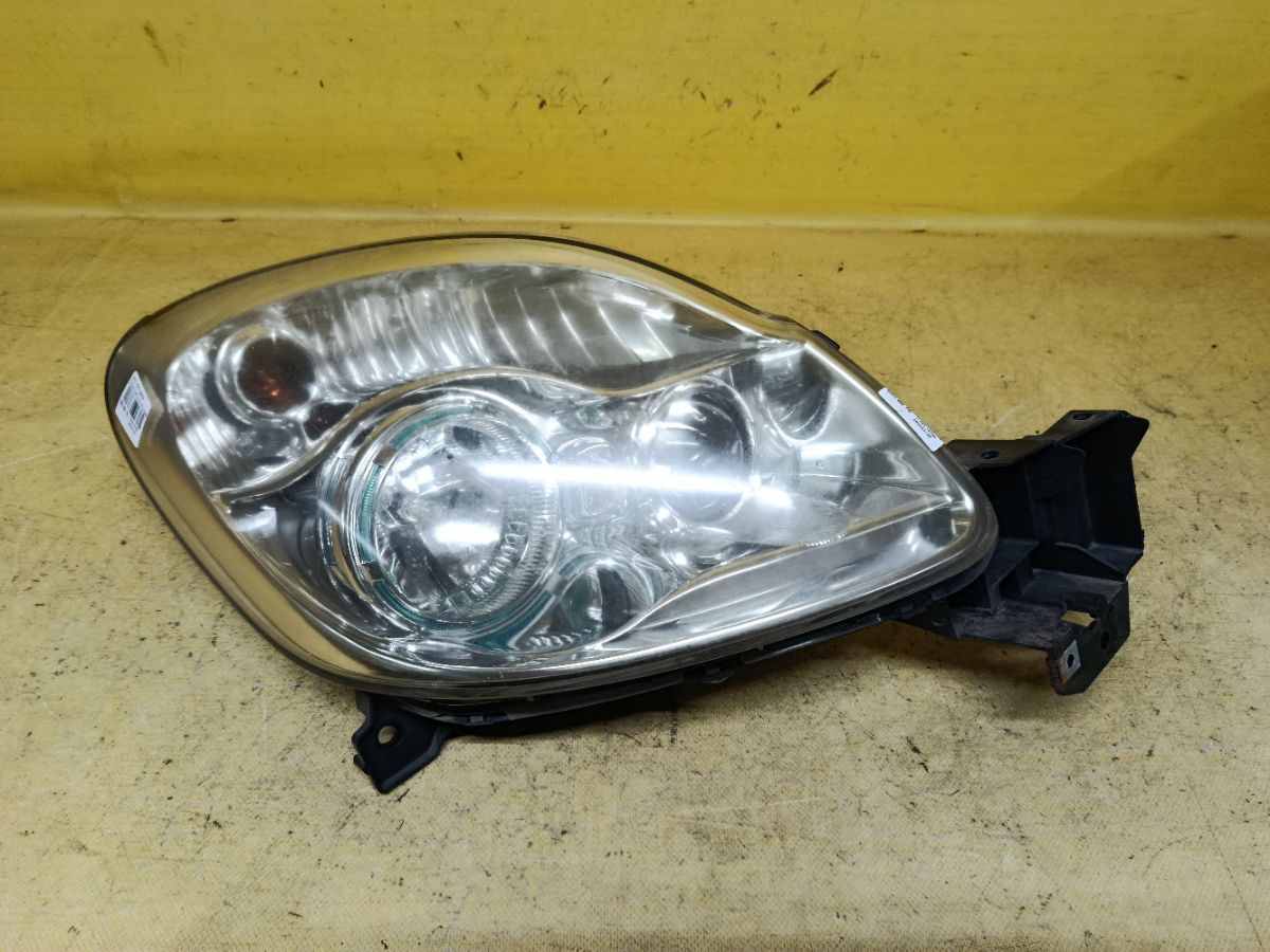 Фара P4514 P4514 на Mazda Verisa DC5W Фото 1