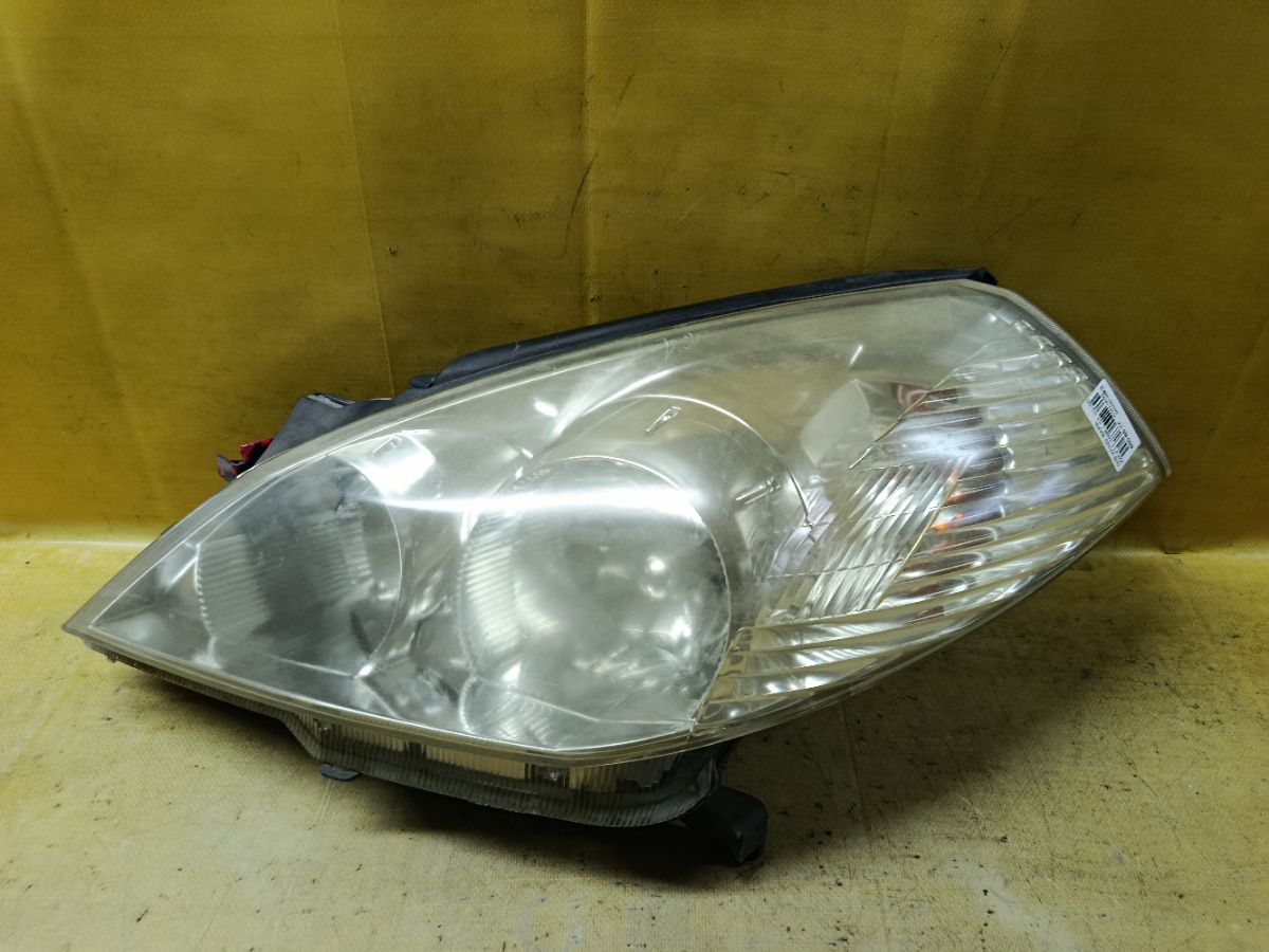 Фара 1698 1698 на Nissan Wingroad WFY11 Фото 1