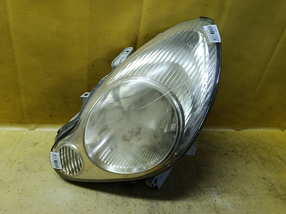Фара P2359 P2359 на Toyota Duet M100A Фото 1