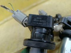 Катушка зажигания 19500-B2051 на Daihatsu Move LA100S KF-VE Фото 2
