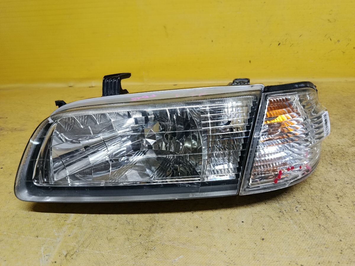 Фара 1602 1602 на Nissan Sunny FB15 Фото 1