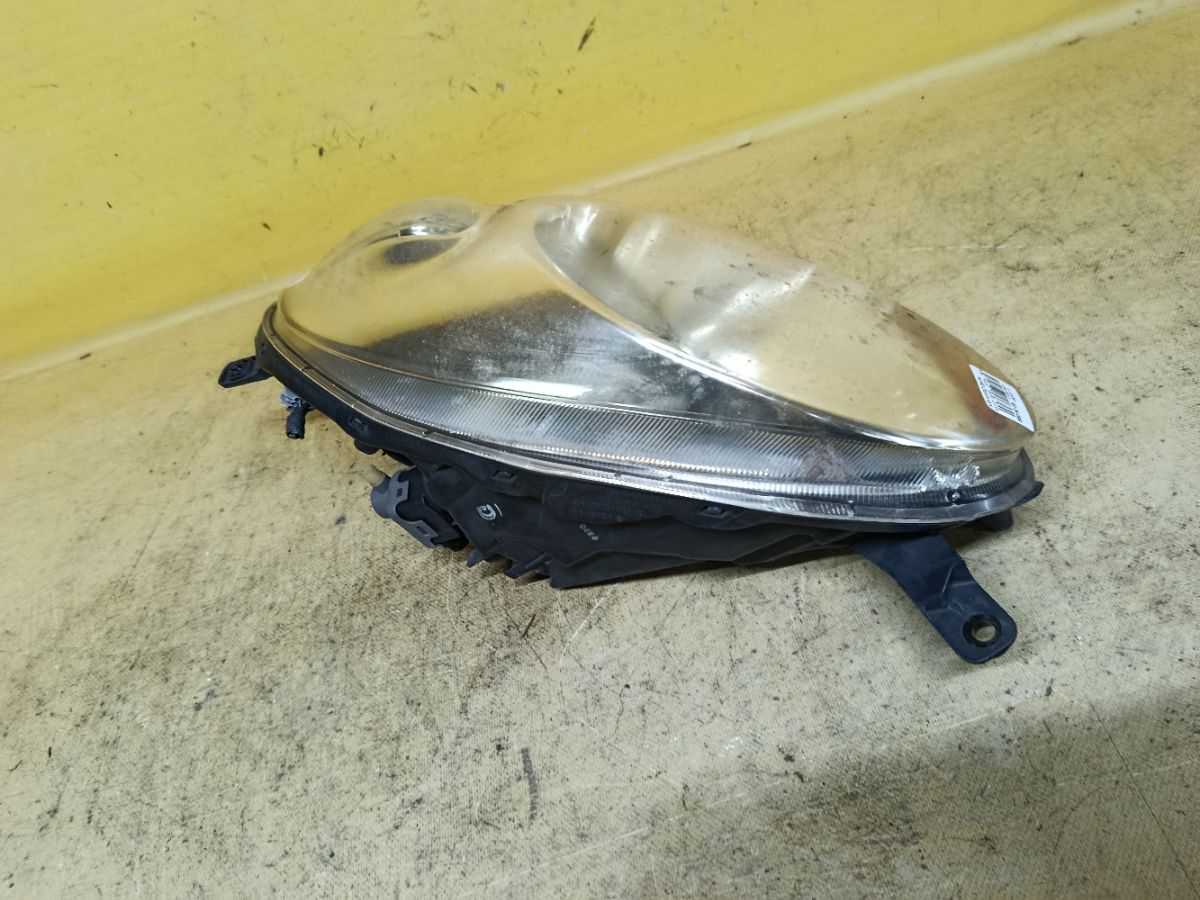 Фара 1816 1816 на Nissan March AK12 Фото 2