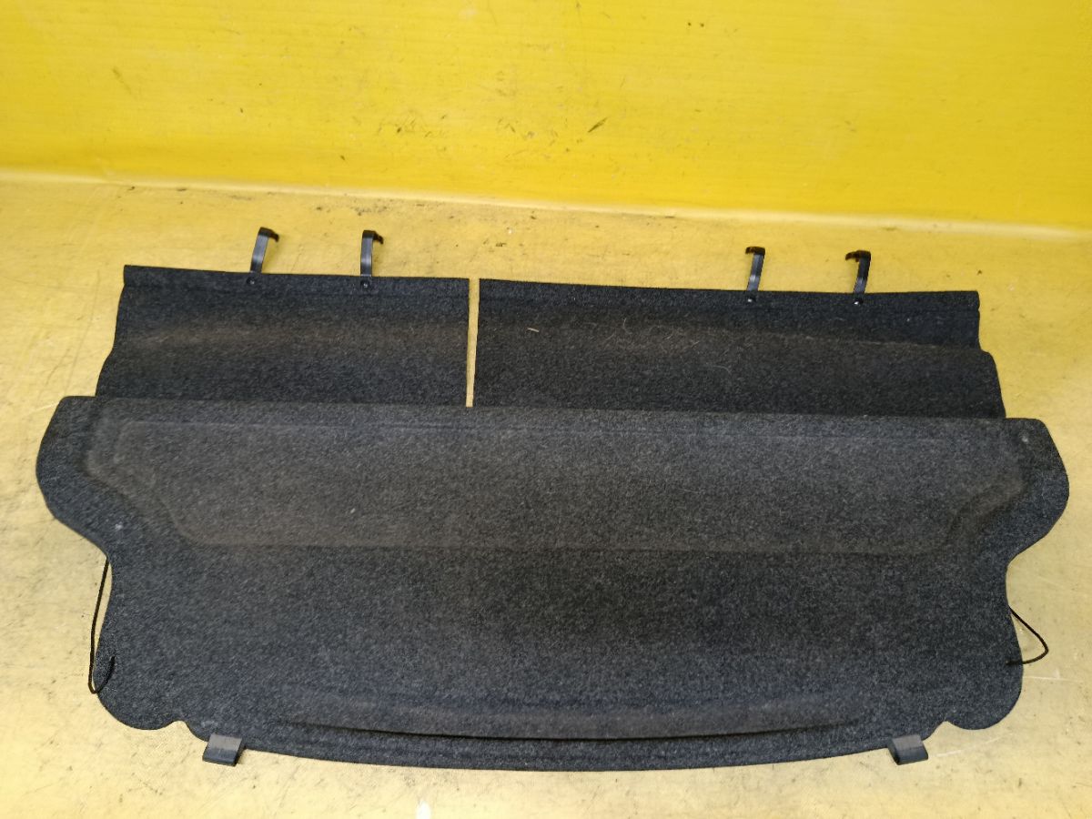Шторка багажника 64330-B1010 на Toyota Passo QNC10 Фото 1