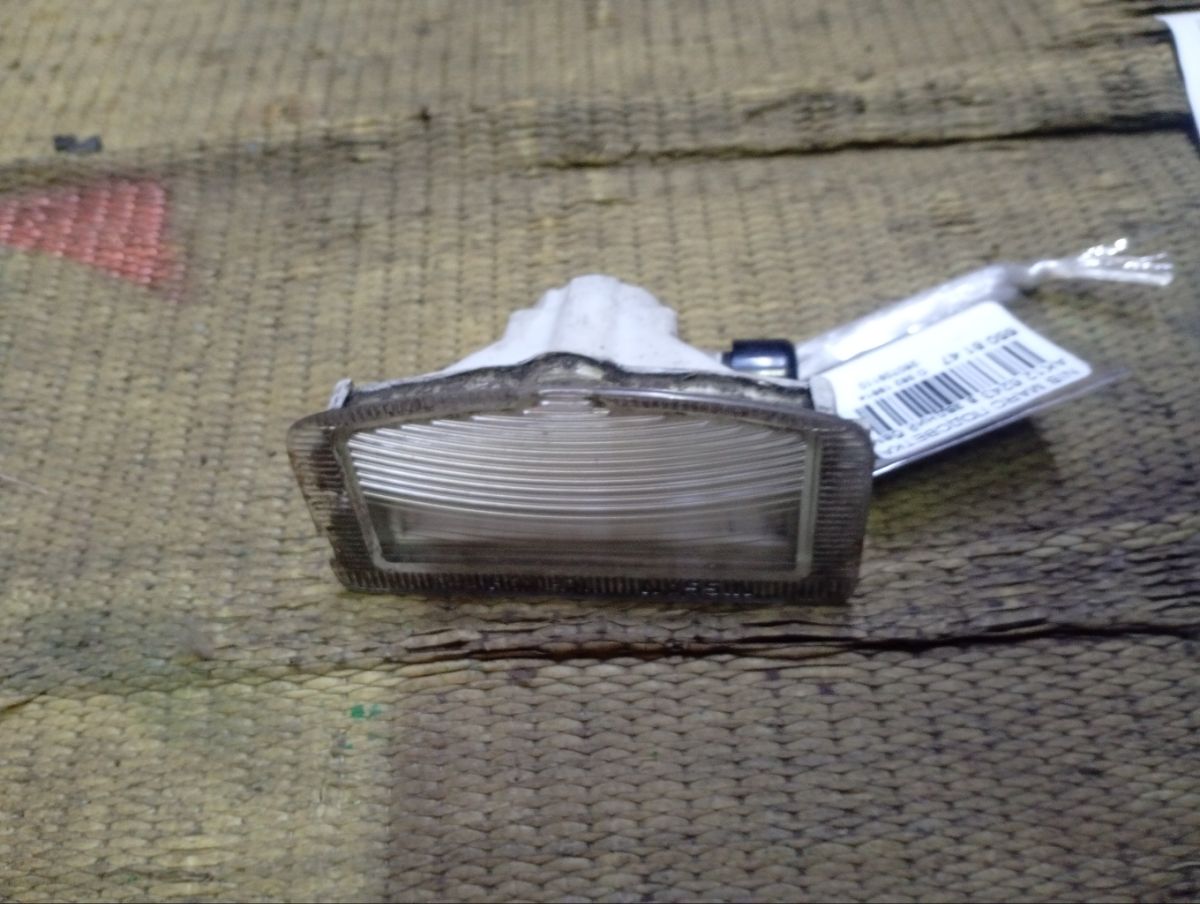 Подсветка номера 6243 6243 на Nissan March AK12 Фото 3