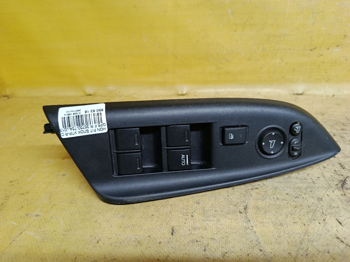 Блок упр-я стеклоподъемниками 35750-T5A-J013-M1-10 на Honda Fit Hybrid GP5 Фото 1