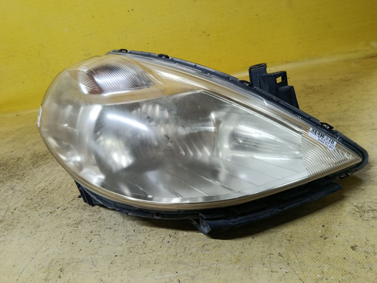 Фара P7779 P7779 на Nissan Tiida C11 Фото 1