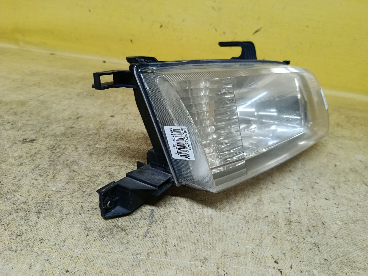 Фара 1602 1602 на Nissan Sunny FB15 Фото 3