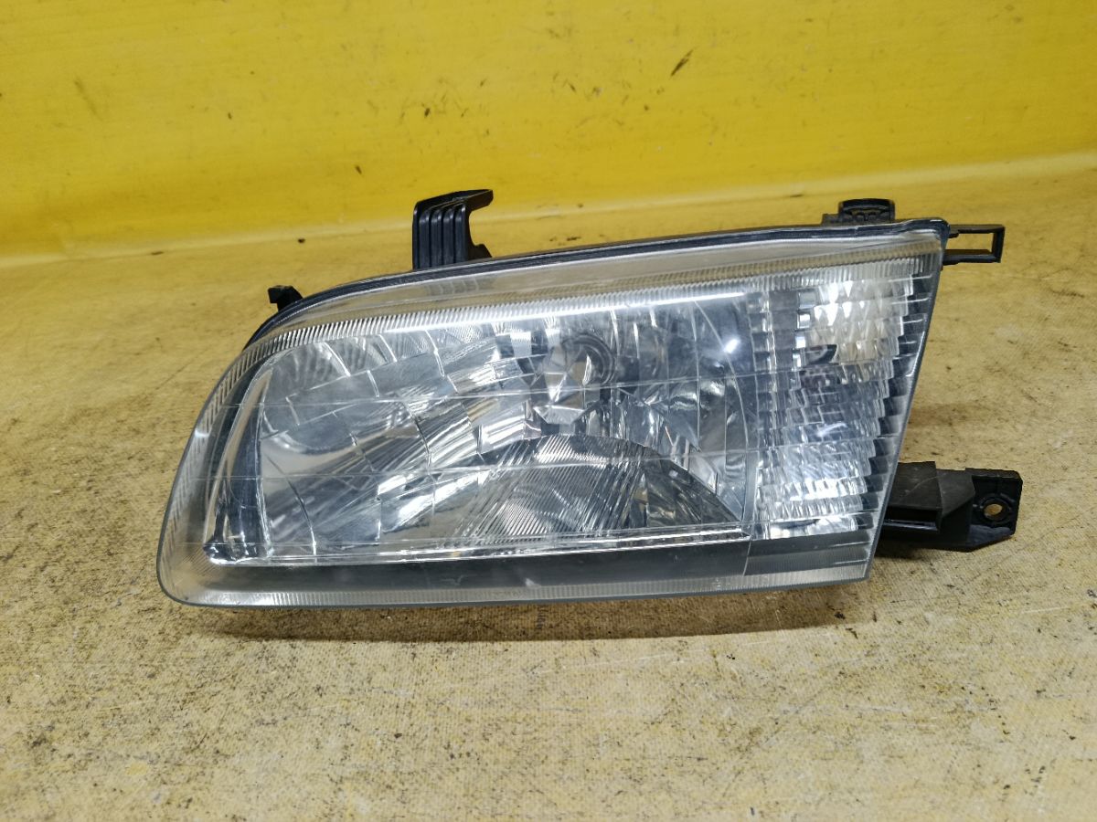 Фара 1602 1602 на Nissan Sunny FB15 Фото 1