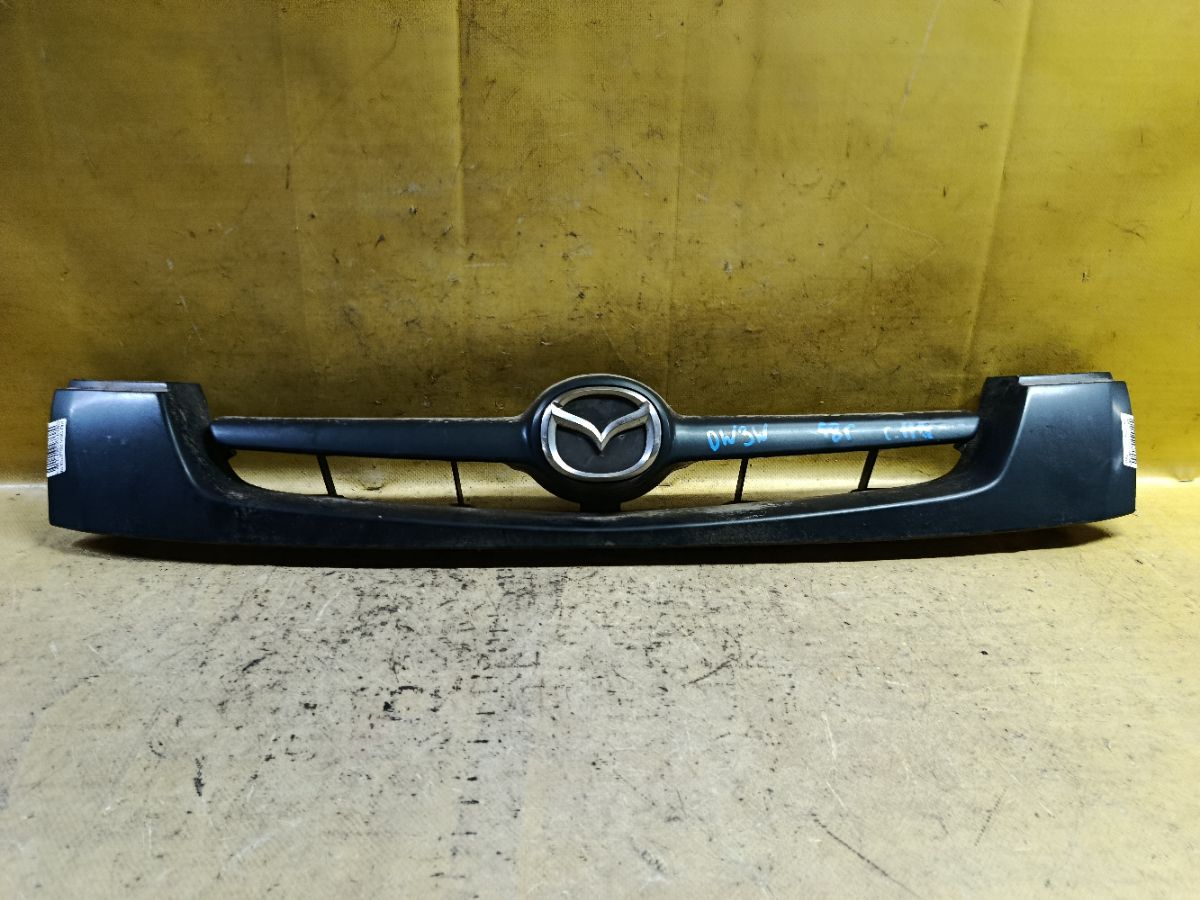 Решетка радиатора D202B0712 на Mazda Demio DW3W Фото 1