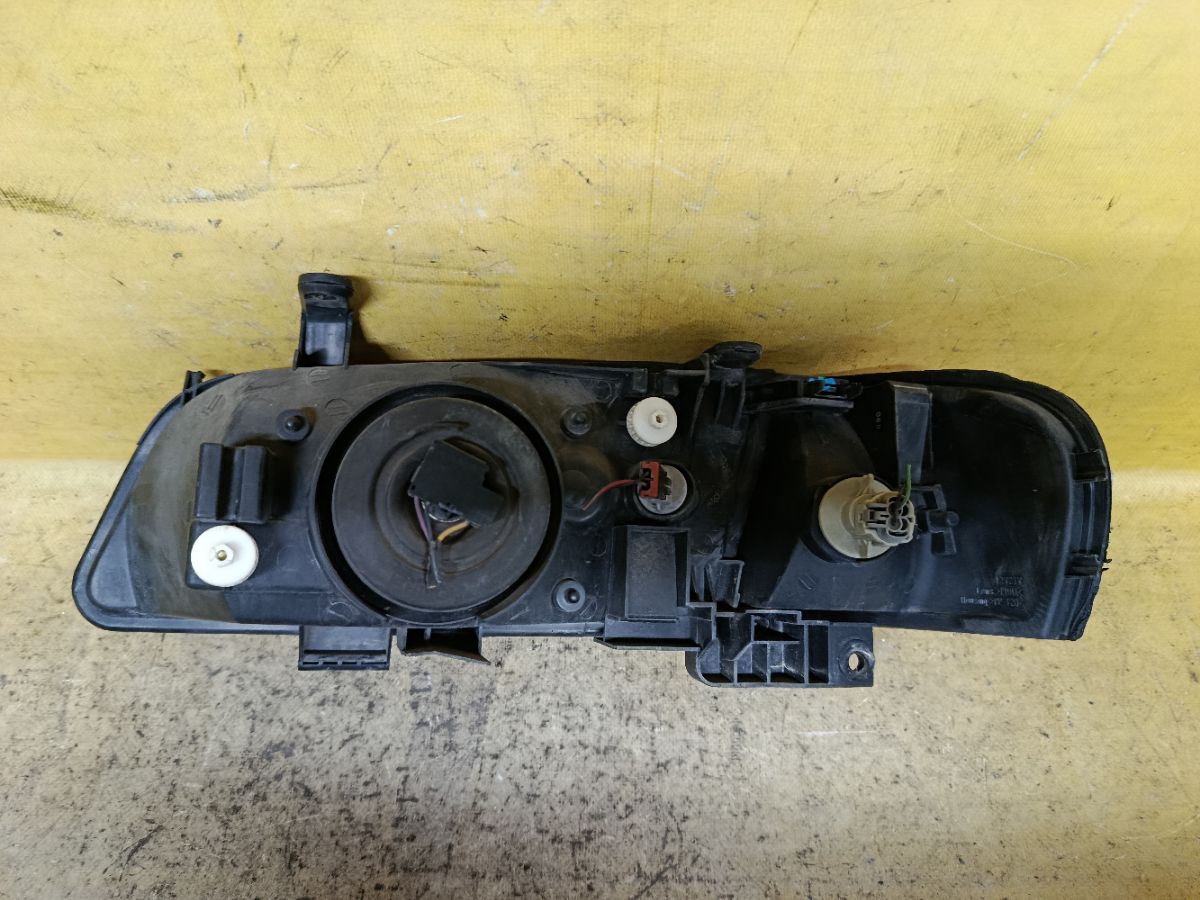 Фара 1602 1602 на Nissan Sunny FB15 Фото 2