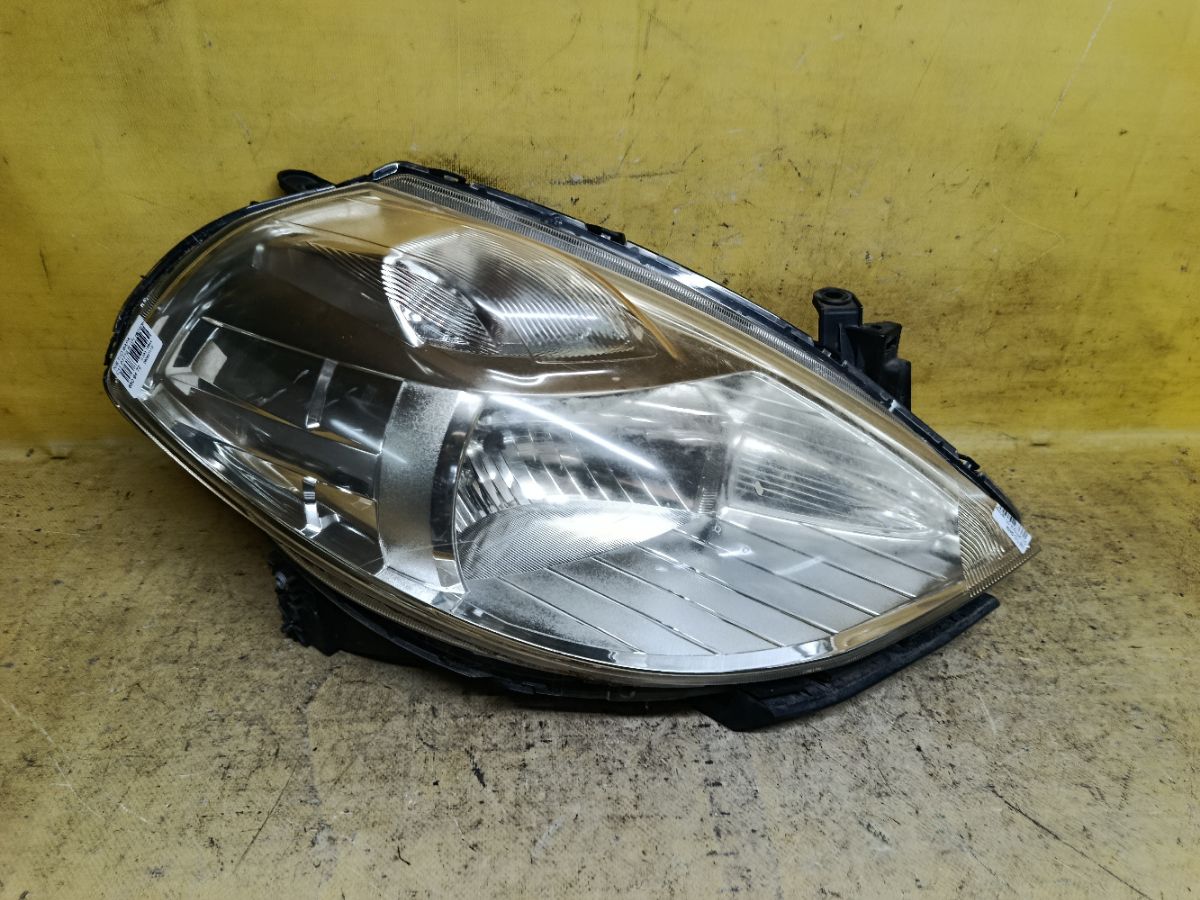 Фара P7779 P7779 на Nissan Tiida C11 Фото 1