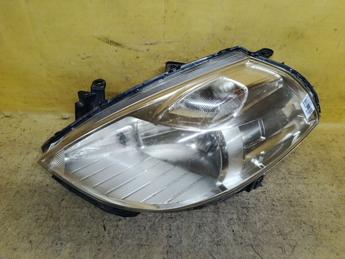Фара P7779 P7779 на Nissan Tiida C11 Фото 1