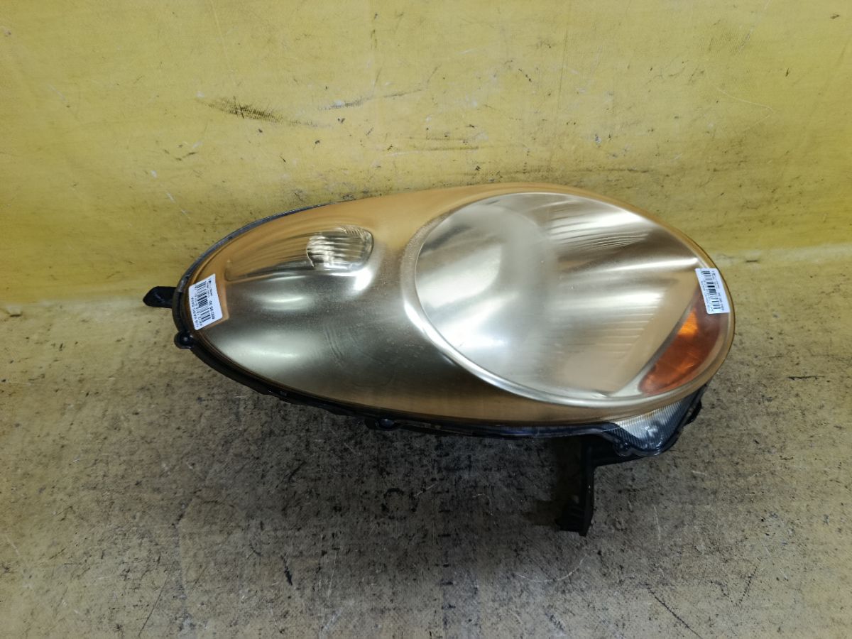 Фара 1816 1816 на Nissan March AK12 Фото 1