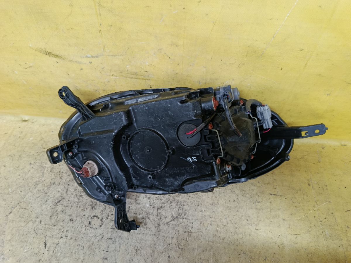 Фара 1816 1816 на Nissan March AK12 Фото 2