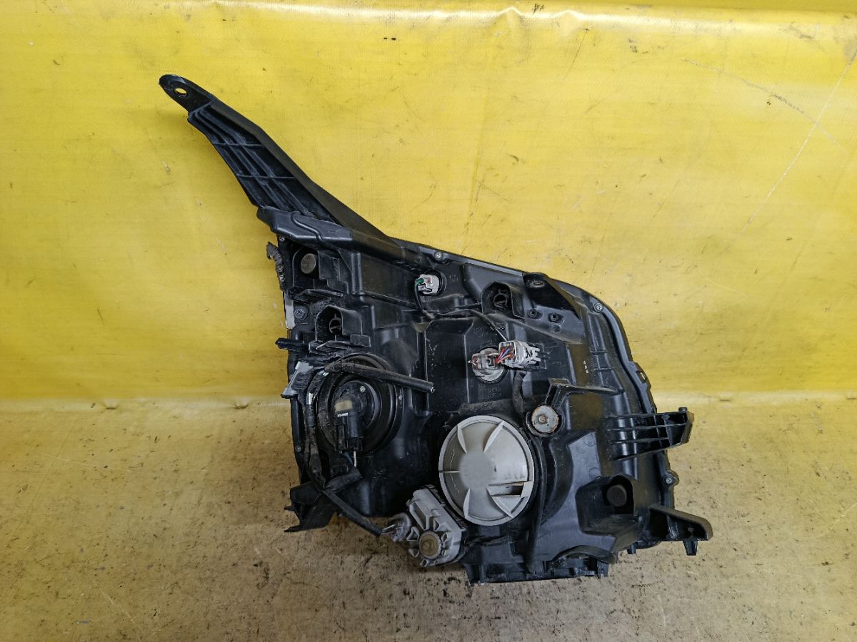 Фара 28-203 28-203 на Toyota Voxy ZRR70G Фото 4