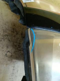 Фара 28-203 28-203 на Toyota Voxy ZRR70G Фото 3