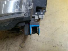 Фара 28-203 28-203 на Toyota Voxy ZRR70G Фото 3