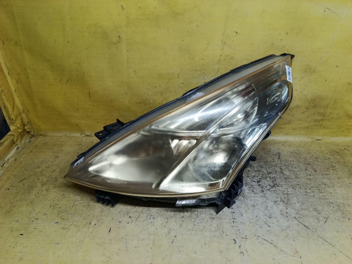 Фара 100-63987 100-63987 на Nissan Teana J32 Фото 1
