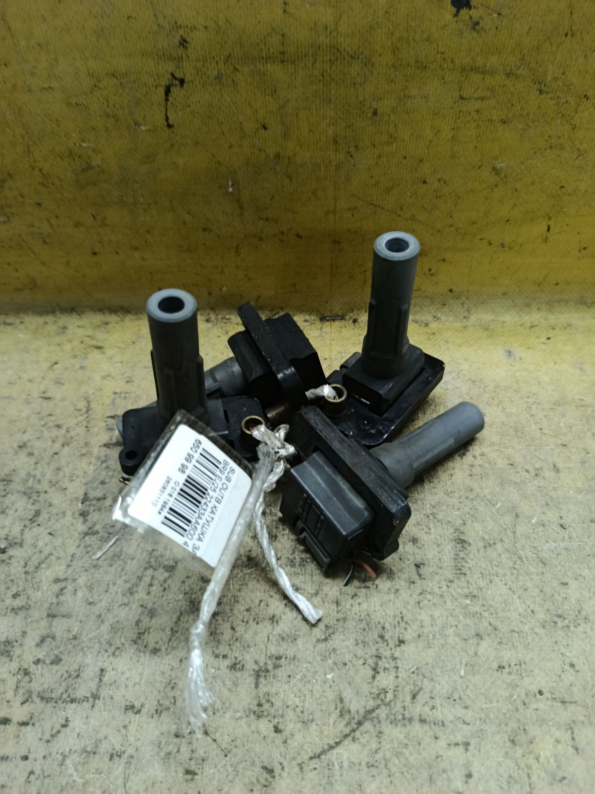 Катушка зажигания 22433AA600 на Subaru Outback BR9 EJ25 Фото 1
