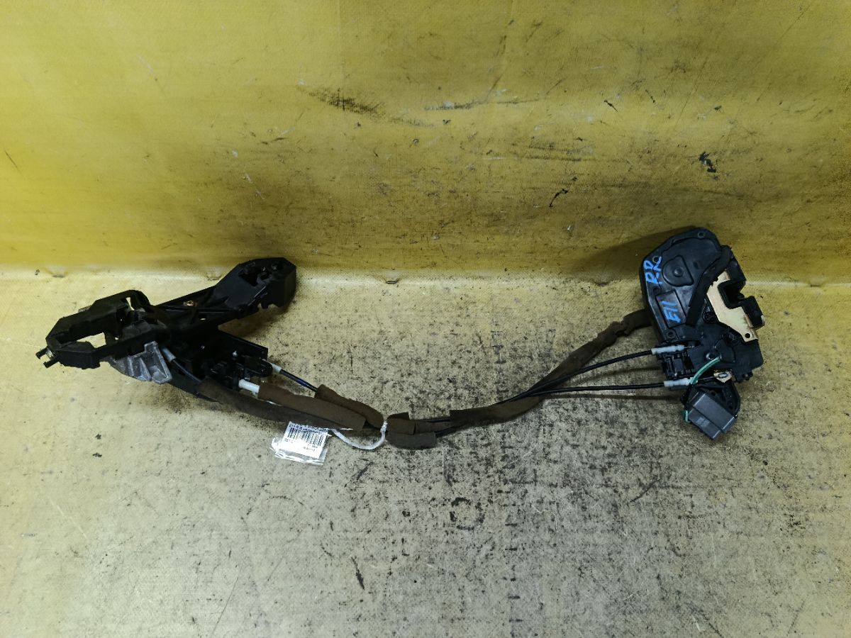 Замок двери на Nissan Note E11 Фото 2