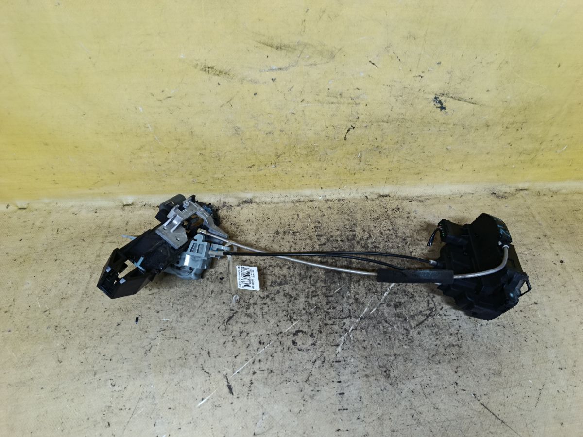 Замок двери на Nissan March AK12 Фото 1