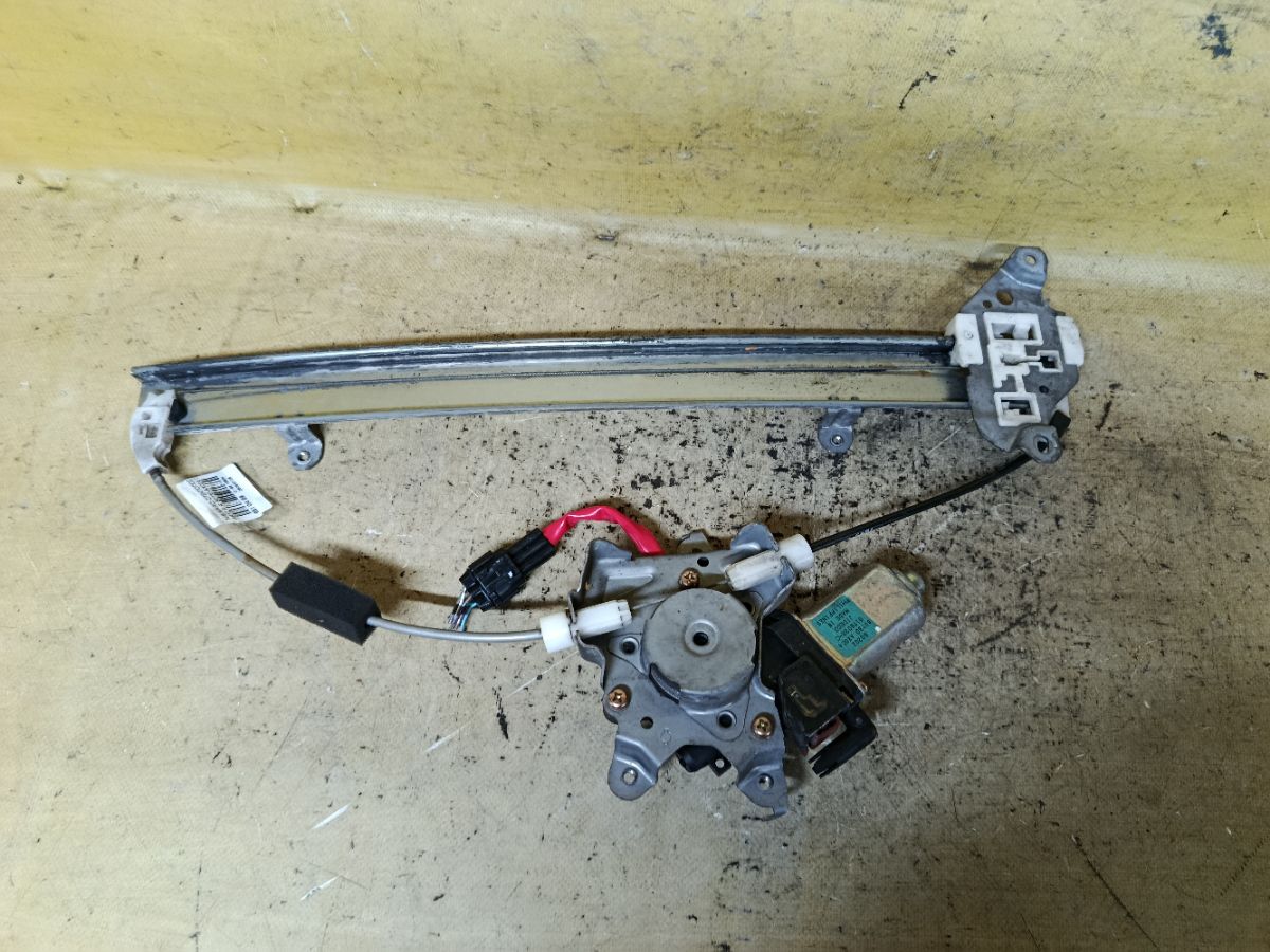Стеклоподъемный механизм 80730-AX004 на Nissan March AK12 Фото 2