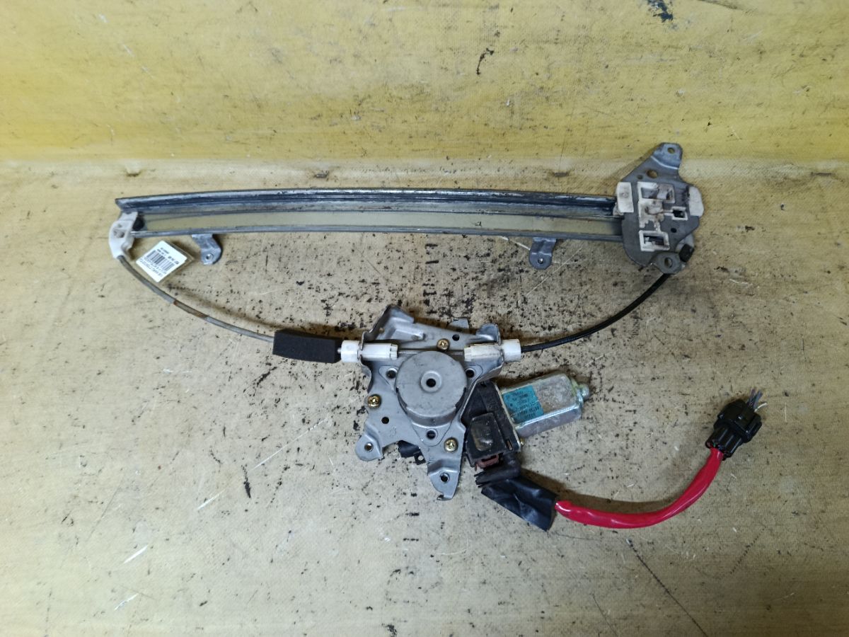 Стеклоподъемный механизм 80730-AX004 на Nissan March AK12 Фото 2