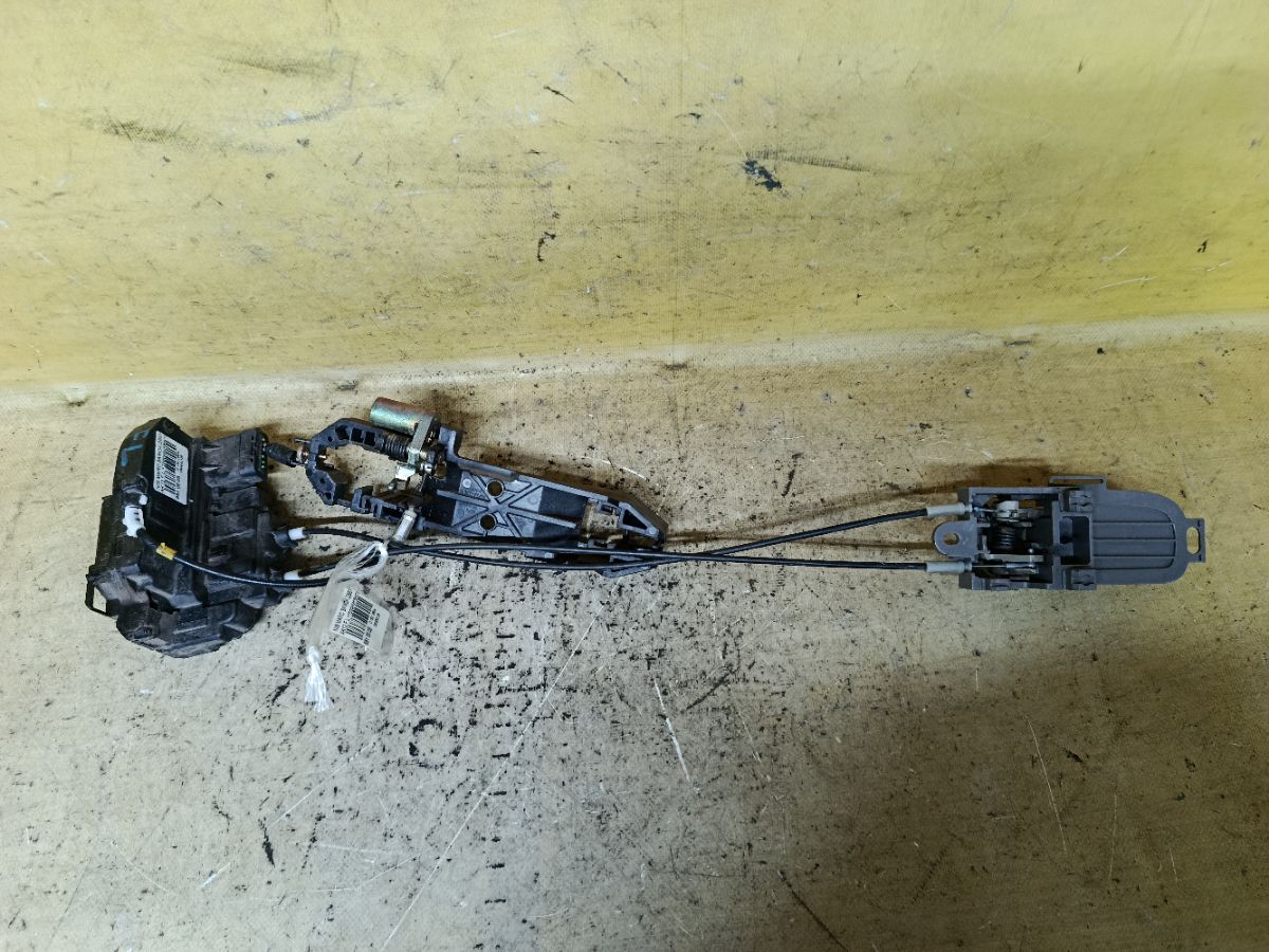 Замок двери на Nissan March AK12 Фото 1