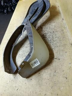Брызговик на Nissan March AK12 Фото 2