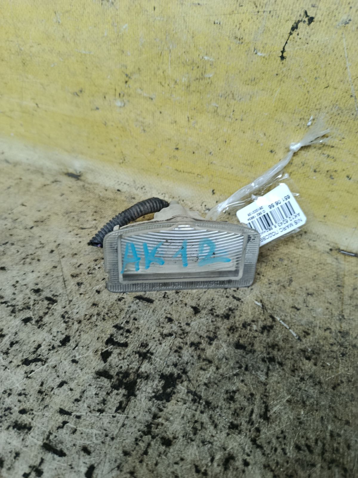 Подсветка номера 6243 6243 на Nissan March AK12 Фото 1