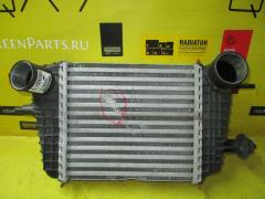 Радиатор интеркулера Y0130002 на Nissan Note E12 HR12DDR Фото 1