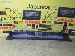 Обшивка багажника на Toyota Corolla Runx NZE124 64716-13130, Заднее расположение
