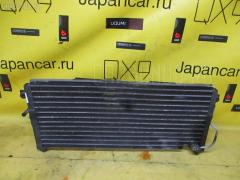 Радиатор кондиционера на Nissan Ad Van VY10 GA13DS Фото 1