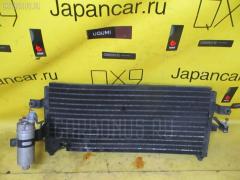 Радиатор кондиционера на Nissan Ad Van VY10 GA13DS Фото 2