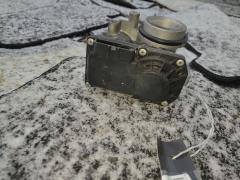 Дроссельная заслонка 22030-23010 на Toyota Ractis SCP100 2SZ-FE Фото 6