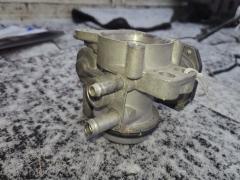 Дроссельная заслонка 22030-23010 на Toyota Ractis SCP100 2SZ-FE Фото 8