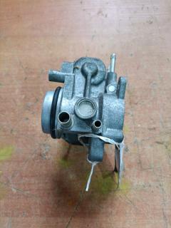 Дроссельная заслонка 22030-23010 на Toyota Ractis SCP100 2SZ-FE Фото 12