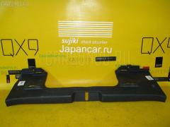 Обшивка багажника 64716-52110 на Toyota Vitz NCP95 Фото 3