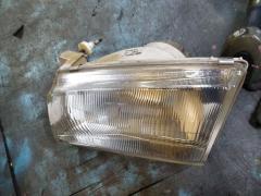 Фара 001-6872 на Mazda Demio DW3W Фото 4