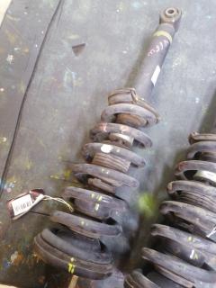 Стойка амортизатора 19-142241, 280 753, 30-B49-A, 317 132, 341251, 551096, CR-049-2364, MR448161, MR448162, MR510423, MR554292, MR554462, SJ-049-2364, ST-049-2364, ST-049F-V75W на Mitsubishi Pajero V65W 6G74 Фото 7