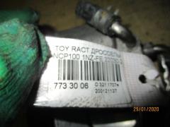 Дроссельная заслонка 22030-21030 на Toyota Ractis NCP100 1NZ-FE Фото 3