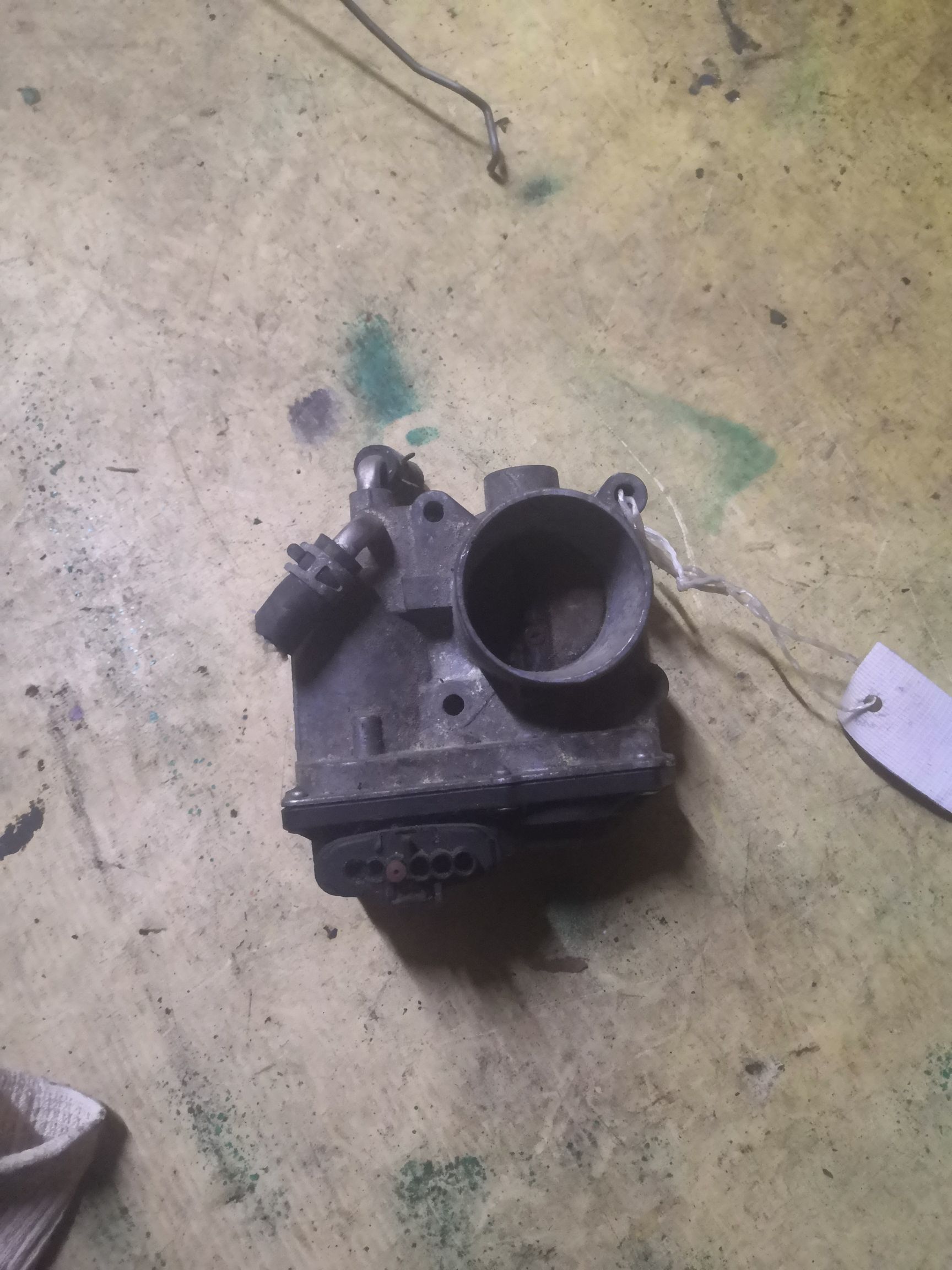 Дроссельная заслонка 22030-21030 на Toyota Ractis NCP100 1NZ-FE Фото 4
