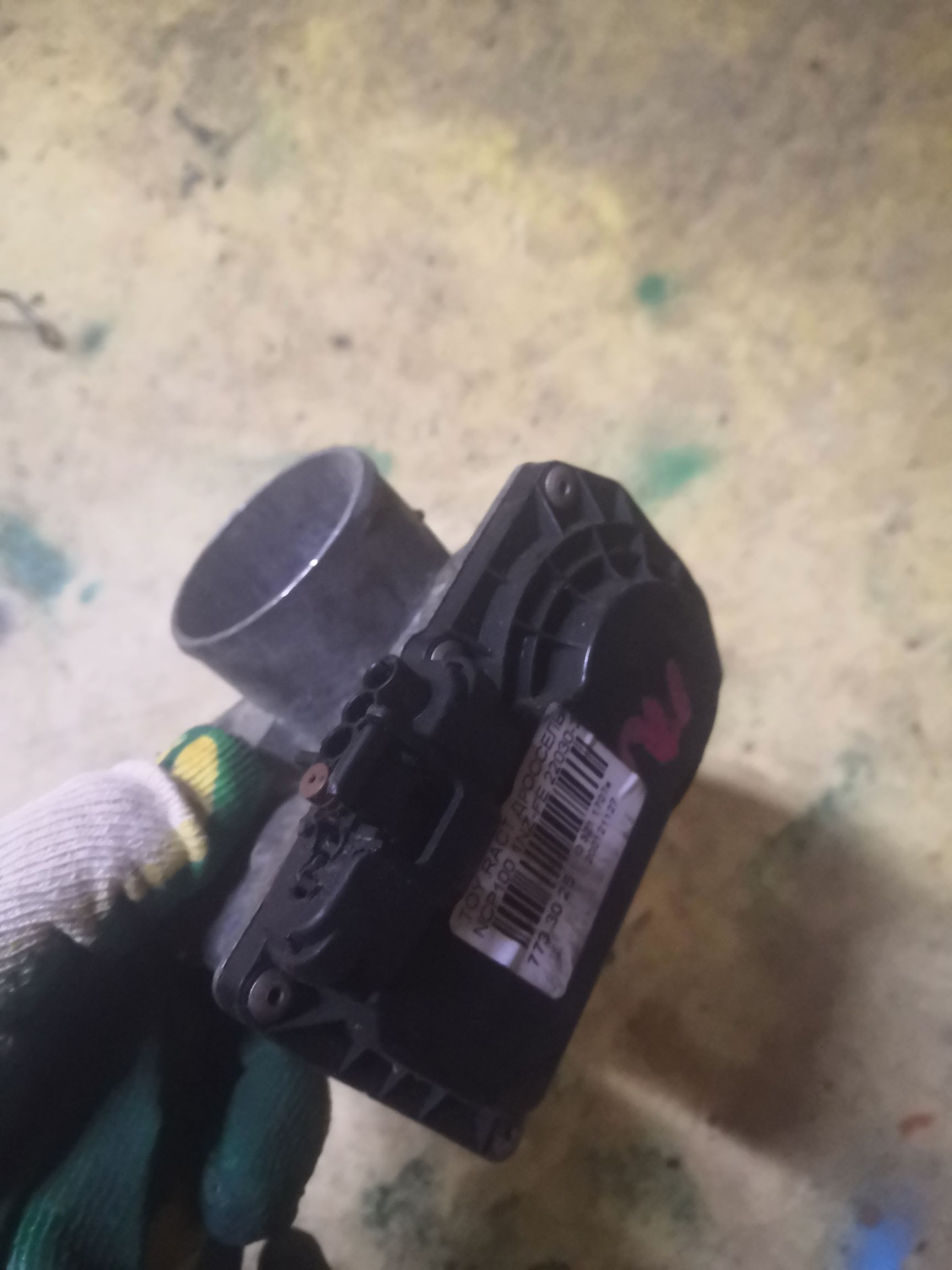 Дроссельная заслонка 22030-21030 на Toyota Ractis NCP100 1NZ-FE Фото 5
