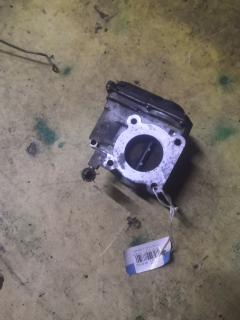 Дроссельная заслонка 22030-21030 на Toyota Ractis NCP100 1NZ-FE Фото 3