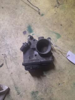 Дроссельная заслонка 22030-21030 на Toyota Ractis NCP100 1NZ-FE Фото 4