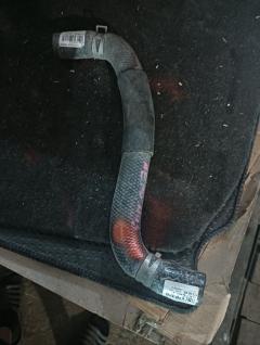 Патрубок радиатора ДВС 16572-15210 на Toyota AE110 5A-FE Фото 2