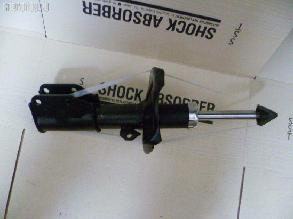 Стойка амортизатора SST ST-049FR-BJ, 30-E85-A, 312 102, 313 588, 333274, 333350, B16R34700A, B2332, B25D34700, B25D34700A, B25D34700B, B25D34700C, B25T-34-700D, B25T34700, B25T34700A, B25T34700B, B25T34700C, B26R-34-700D, B26R-34-700E, B26R34700, B26R34700A, B26R34700B, B26R34700C, B27F34700A, B28V-34-700B, B28V34700A, B30D-34-700B, B30D-34-700C, B30K-34-700C, B30K34700B, B30P-34-700A, B30P-34-700B, B30P-34-700C, B30P-34-700D, B33P-34-700, B34H-34-700, BJ3D-34-700E, BJ3D34700, BJ3D34700A, BJ3D34700B, BL2A-34-700A, BL2A-34-700B, BL2A-34-700C, BL8P-34-700A, BL8P-34-700B, BL8P-34-700C, BL8P34700, BN5V-34-700, C10034700D, C10034700F, CR-049-7138, CR-049FR-BJ, CR8907, SJ-049-7138, ST-049-7138, ST-049FR-CP8W на Mazda Familia S-Wagon BJ3W Фото 1