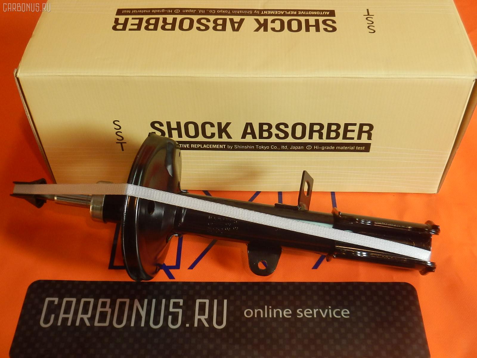 Стойка амортизатора SST ST-049RR-AE90, 110 839, 19-063560, 22-049391, 32-A43-A, 333051, 48530-12410, 4853002020, 4853012180, 4853012200, 4853012201, 4853012220, 4853012221, 4853012240, 4853012241, 4853012260, 4853012261, 4853012280, 4853012290, 4853012300, 4853012301, 4853012320, 4853012321, 4853012390, 4853012430, 4853012500, 4853012520, 633102, B2124, CR-049-1165, SJ-049-1165, ST-049-1165 на Toyota Corolla AE100 5A-FE Фото 1