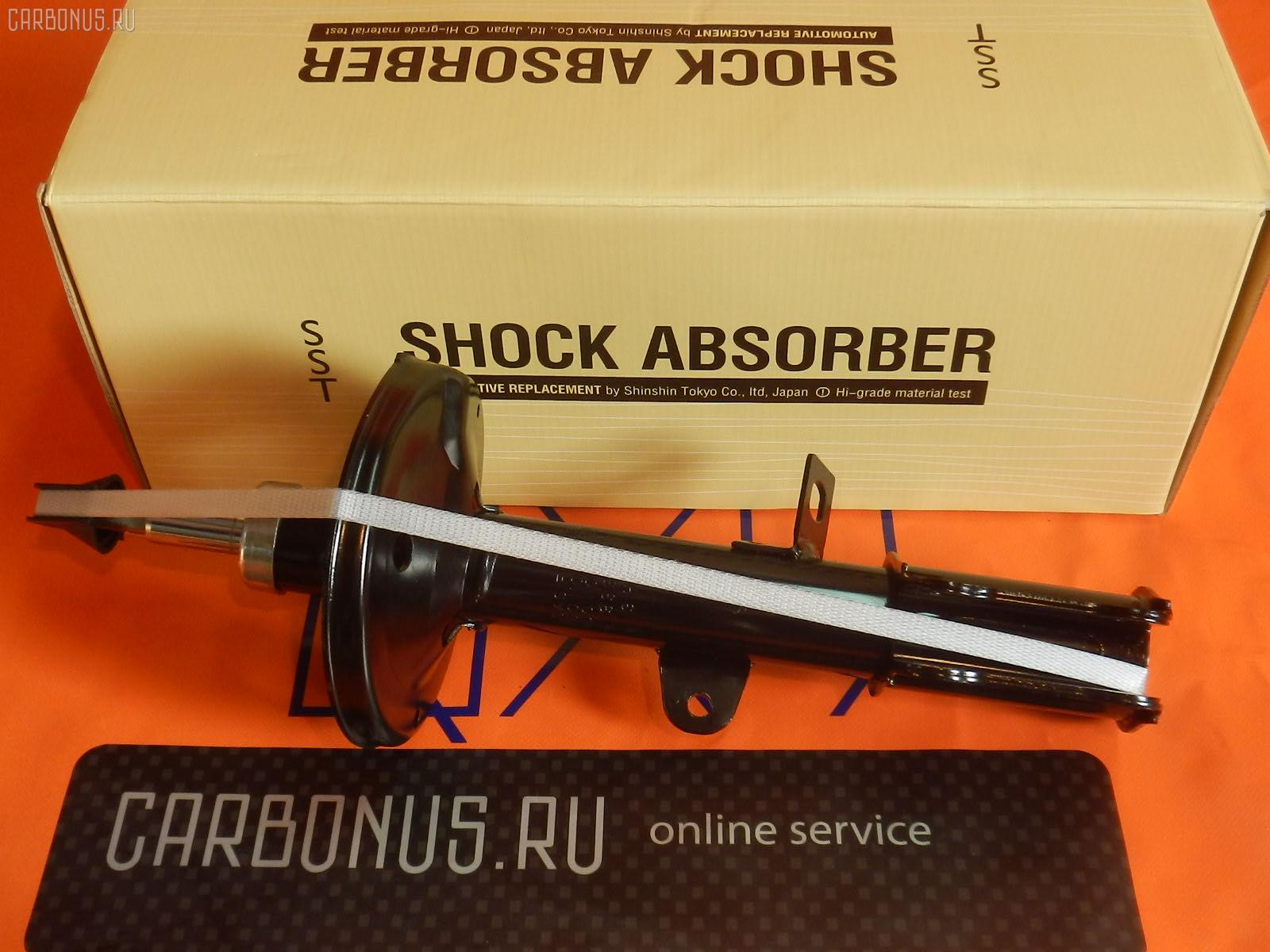 Стойка амортизатора SST ST-049RR-AE90, 110 839, 19-063560, 22-049391, 32-A43-A, 333051, 48530-12410, 4853002020, 4853012180, 4853012200, 4853012201, 4853012220, 4853012221, 4853012240, 4853012241, 4853012260, 4853012261, 4853012280, 4853012290, 4853012300, 4853012301, 4853012320, 4853012321, 4853012390, 4853012430, 4853012500, 4853012520, 633102, B2124, CR-049-1165, SJ-049-1165, ST-049-1165 на Toyota Corolla AE100 5A-FE Фото 1